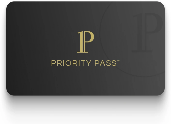 The black Priority Pass membership card with its gold monogram.